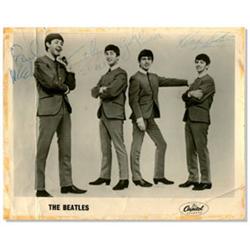 Beatles Capitol Records Autograph Photograph. A Capitol Records promotional photograph featuring …