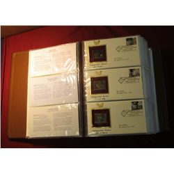96. Large simulated Leather bound album "Golden Replicas of United States Stamps proof replicas on a