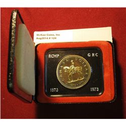 124. 1873-1973 "Mounted Police" Canada Silver Prooflike Dollar. In original Royal Canadian Mint felt
