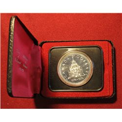 128. 1876-1976 Library of Parliament Canada Silver Prooflike Dollar. In original Royal Canadian Mint