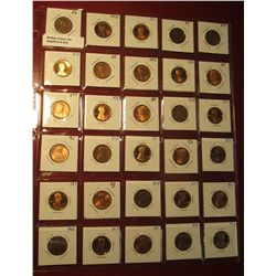 214. Plastic Stock page containing (30) Lincoln Cents in 1 1/2" x 1 1/2" holders. Includes some Proo