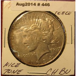 446. 1934 P U.S. Peace Silver Dollar. Unc. Light toning. Better date.