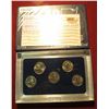 Image 2 : 700. 2005 Philadelphia Mint Five-Piece Set of Statehood Quarters in a specialty holder. Gem BU .
