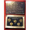Image 1 : 704. 2003 Philadelphia Mint Five-Piece Set of Statehood Quarters in a specialty holder. Gem BU .