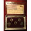 Image 2 : 709. 2003 Denver Mint Five-Piece Set of Statehood Quarters in a specialty holder. Gem BU .