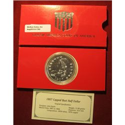 762. Large size 1807 Capped BustHalf Dollar Copy in holder, plated in .999 Fine Silver.