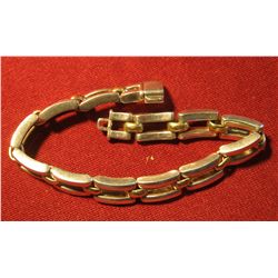 822. HEAVY link bracelet, marked 925 ITALY, small links appear to be gold weighs 40+grams