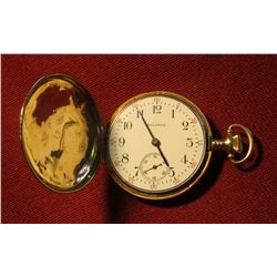 828. 14K Waltham pocket watch, case is marked 14K 0.585 FINE GUARANTEED. Winds, runs, keeps time. We