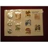 Image 2 : 890. Souvenir sheet of 3 coins and 7 stamps from China. Coins look BU , stamps are unused