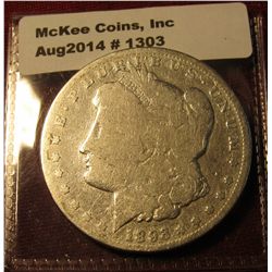 1303. 1893-CC Morgan Silver Dollar G/VG with an old cleaning – clear date and mint mark, still a tou