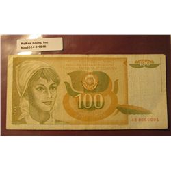 1546. Pick Catalog No. 105. 1.1.1990 Yugoslavia 100 Dinara.Girl at Left. Luminous plant design on ba