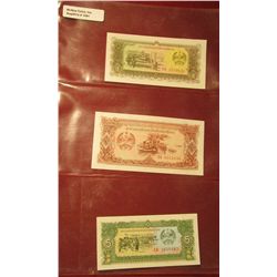 1561. (3) Crisp Unc Laos Bank notes. 5, 10, & 20 Riels. All stored in a plastic page.