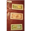 Image 1 : 1561. (3) Crisp Unc Laos Bank notes. 5, 10, & 20 Riels. All stored in a plastic page.