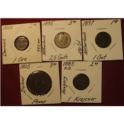 1590. 1885 KB Hungary 1 Krajczar; 1805 Ireland Penny; 1897 Netherlands 1c holed; 1895 Netherlands 25