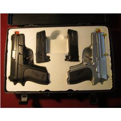 1598. New Pair CYMA Air Sport Guns in a case.