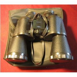 1601. BU shnell 10 x 50 mm Binoculars in Carrying case.
