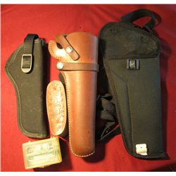 1603. BU ck Honemaster No. 136 in original case; (2) black Uncle Mike style Pistol Holsters; Hunter 