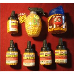 1605. (7) Various containers of Airsoft Pellets.