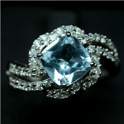 WHITE GOLD OVER STERLING SILVER BLUE TOPAZ RING - SZ 7