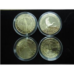 4 GRAND CASINO GAMING TOKENS 3 WONDERS OF THE