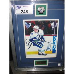 MASON RAYMOND SIGNED PHOTOGRAPH AND PIN FRAMED ARTWORK