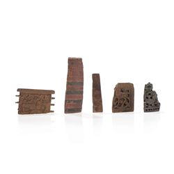 Collection of Five Carved Wood Fragments, 8th to 17th C