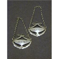 HESTER BATEMAN, c.1775, a pair of wine labels, 'Brandy' and 'Rum', engraved on classical urn, sur...