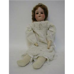 AN ARMAND MARSEILLE BISQUE HEAD DOLL, brown wig, sleeping eyes, open mouth, kid body, linen costu...