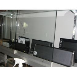 SHELF LOT OF DOCKING STATIONS, TABLET, GPS, AND DIGITAL PHOTO FRAME; BOSE, SONY, GARMIN ETC