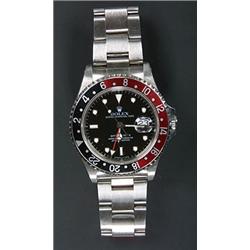 Rolex, Oyster G.M.T. Master II, a gentleman's stainless steel bracelet watch, circa 1990, the bla...