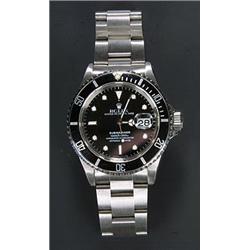 Rolex, Oyster Date Submariner, a gentleman's stainless steel bracelet watch, circa 1990, the blac...