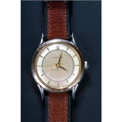 Eterna, a gentleman's stainless steel wristwatch, circa 1950, the duo-tone silvered dial with tap...