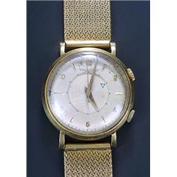 Jaeger-le-Coultre, Memovox, a gentlemen's 18ct gold alarm wristwatch, circa 1955, the silvered di...