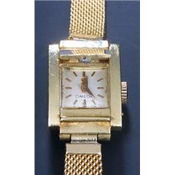 Omega, a lady's 18ct gold rectangular wristwatch, the silvered dial with baton numerals and dauph...