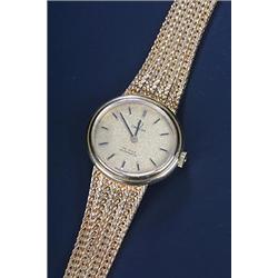 Omega, DeVille, a lady's 18ct gold bracelet watch, circa 1965, ref. 551 8367, the gold dial with...