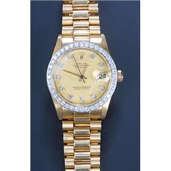 Rolex, Oyster Midi, an 18ct gold and diamond bracelet watch, circa 1982, No.7353141, the champagn...