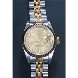 Rolex, Oyster Datejust, a lady's stainless steel and gold bracelet watch, circa 1990, No.X213419,...