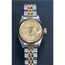 Rolex, Oyster Datejust, a lady's stainless steel and gold bracelet watch, circa 1991, No.N138387,...