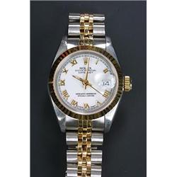 Rolex, Oyster Datejust, a lady's stainless steel and gold bracelet watch, circa 1986, No.9654706,...