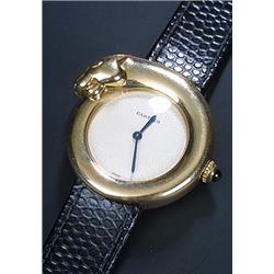 Cartier, Panther Head, a lady's 18ct gold wristwatch, ref.2325, No.CC293743, the engine turned iv...