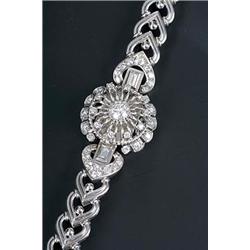 Longines, a lady's platinum and diamond cocktail wristwatch, circa 1940, No. 6025829, the round s...