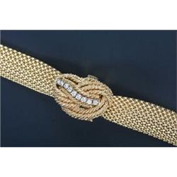 Geneve, a lady's 14kt gold cocktail bracelet watch, circa 1950, ref 4244810, the silvered dial wi...