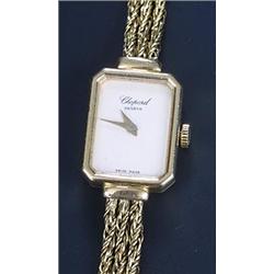 Choppard, a lady's 18ct gold bracelet watch, circa 1960, ref. 5129, the ivory dial with dauphine...