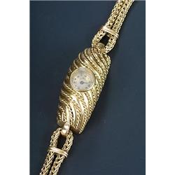 Mido, Multifort, a lady's gold designer bracelet watch, round silvered dial with black Arabic num...