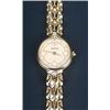 Image 1 : Titan, Tanishq, a lady's Indian 18kt gold bracelet watch, circa 1990, ref 338AA OIAU, the champag...