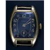 Image 1 : Longines, a gentleman's 18ct gold wristwatch, circa 1920, the black dial with gold Arabic numeral...