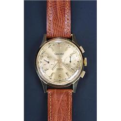 Girandet, chronograph, a gentleman's 18ct gold wristwatch, circa 1955, ref 13002, the champagne d...