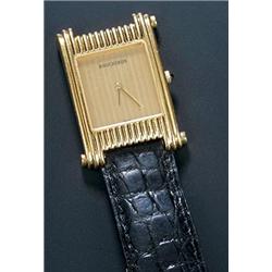 Boucheron, a gentleman's 18ct gold rectangular wristwatch, circa 1970, No.A256/813, the brushed g...