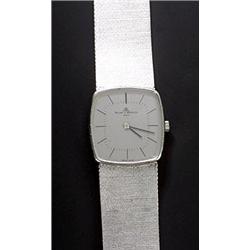 Baume & Mercier, a gentleman's 18ct white gold bracelet watch, circa 1970, the silvered dial with...