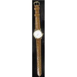 Blancpain, a lady's 18ct gold round wristwatch, circa 1970, no.2393, the white dial with gold Rom...